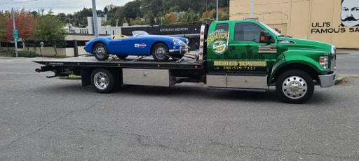 flatbed-towing-vintage-convertible-blue